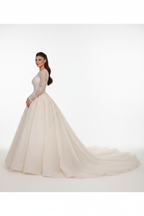 NIL-123 soft ivory princess ball gown side view with luxury tulle skirt by NIL Wedding Dress